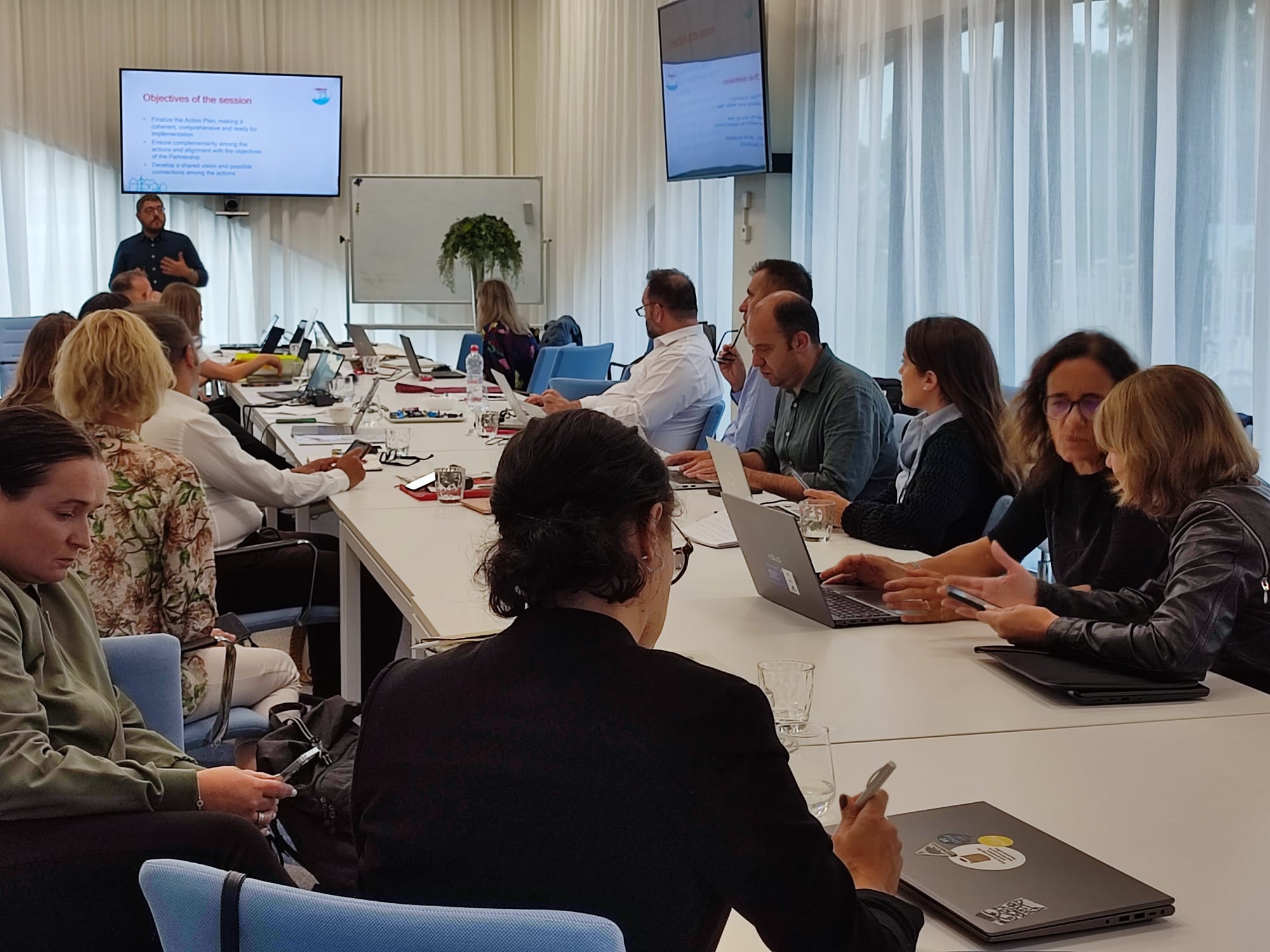 Partners sitting in the meeting room